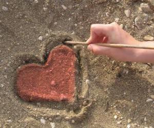 Puzzle Καρδιά εφιστάται στην άμμο